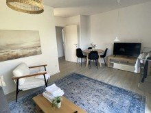 Wohnzimmer Erdgeschoss rechts Attraktive Kapitalanlage - Neuwertiges-Mehrfamilienhaus mit 5 Wohneinheiten!
