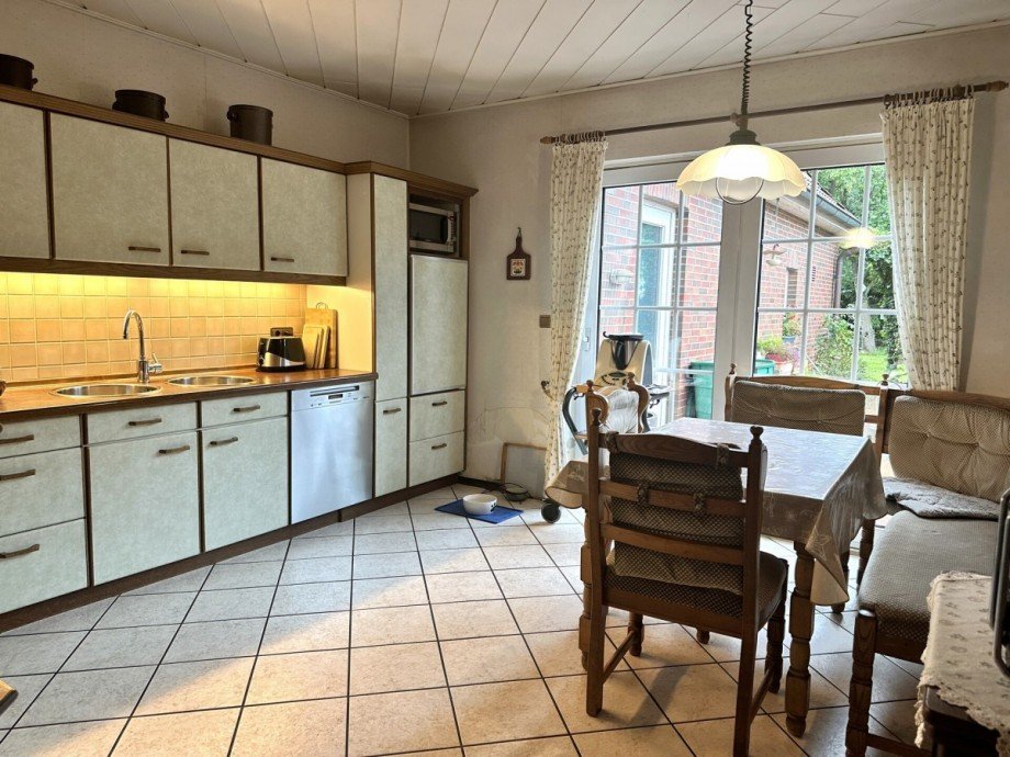 K�che mit Terrassenausgang Landhaus Wiefelstede / Heidkamperfeld