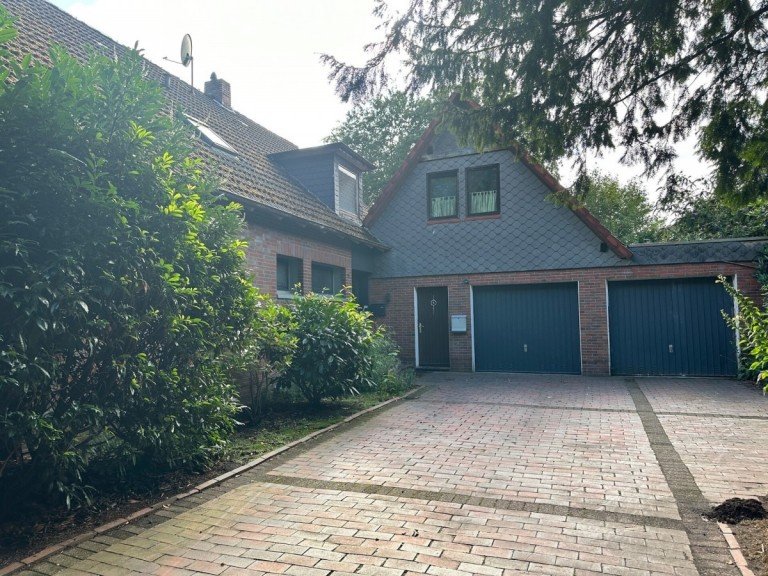 Solider Klinkerbau Wiefelstede-Bokel - Wiefelstede Zweifamilienhaus Kapitalanlage: Dreifamilienhaus in Dorflage