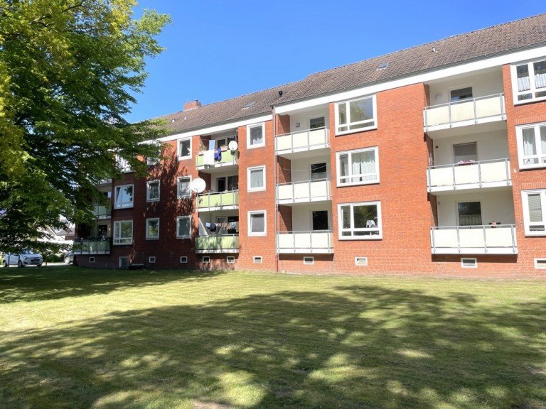 Au�enansicht Westerstede - Westerstede Wohnung Solide Kapitalanlage: Vermietete 4-Zimmer-Wohnung mit Balkon!