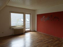 Wohnzimmer mit Balkon 5 % Rendite mit einem guten Mieter
