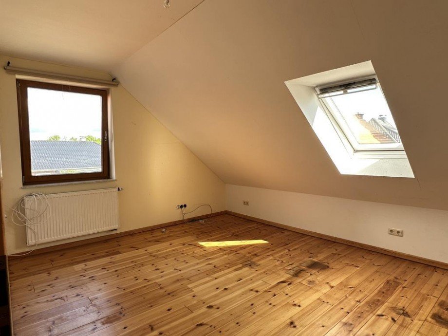 Eines der Schlafzimmer Einfamilienhaus Wiefelstede